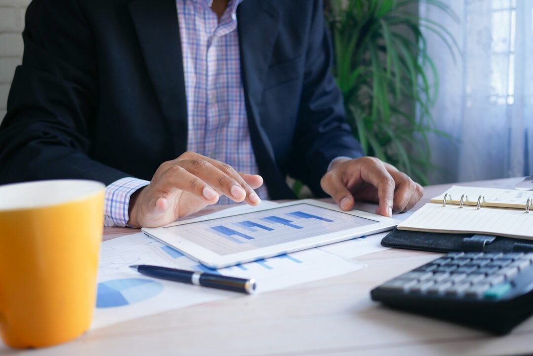 person reviewing monthly expenses