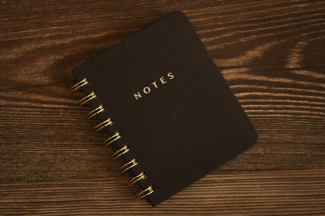 notebook with income notes