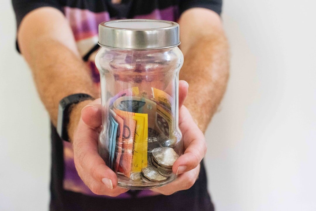 savings jar with coins
