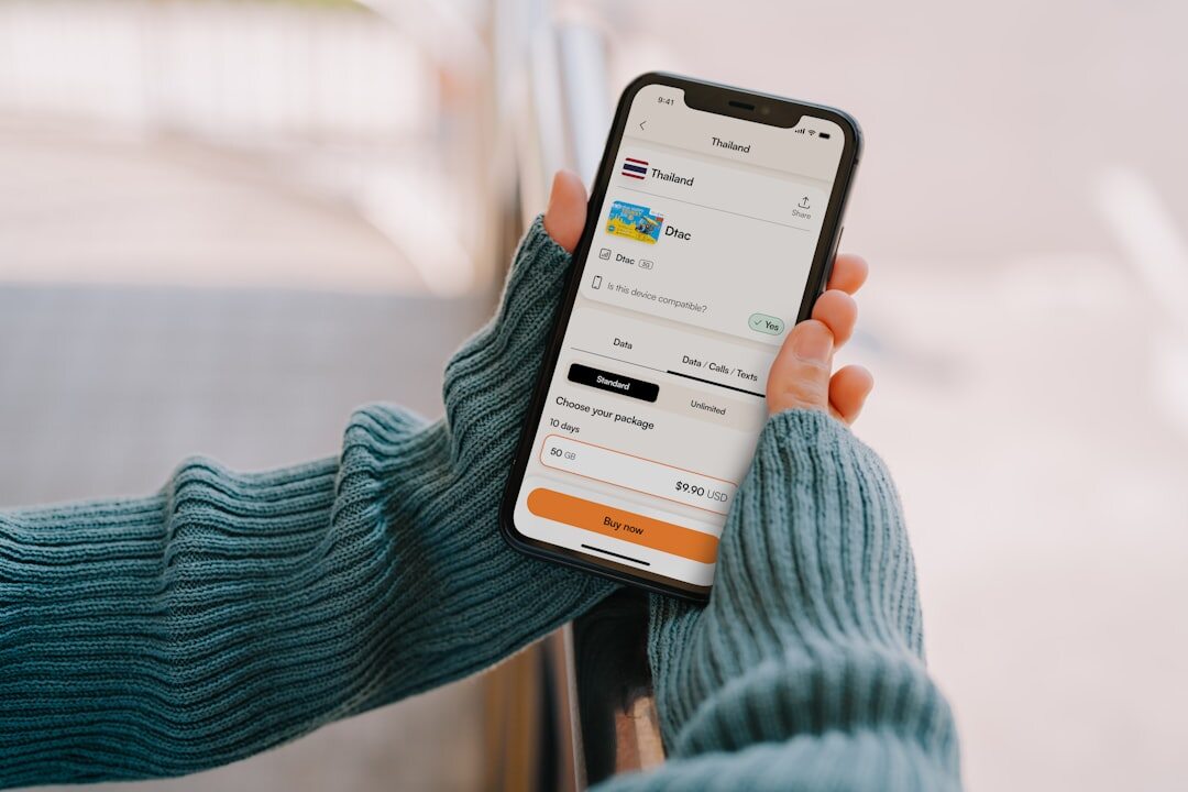 woman checking bank app on phone